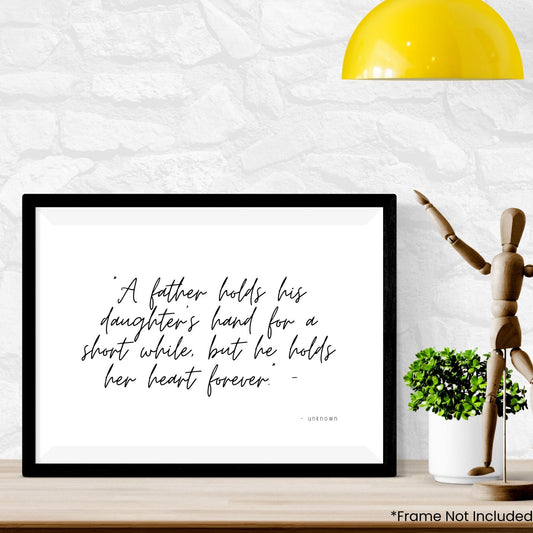 a-father-holds-his-daughters-hand in frame